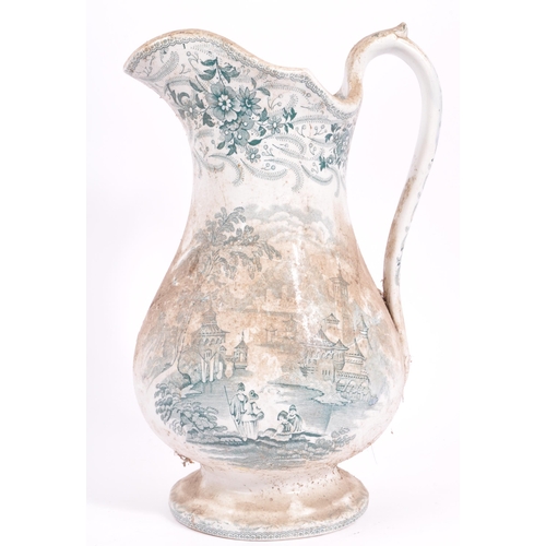 124 - A large early 20th century Victorian ceramic jug of tapering form having applied transfer decoration... 