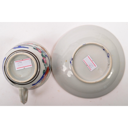 126 - A Chinese / Oriental ceramic porcelain cup and saucer having hand painted multi-coloured foliate and... 