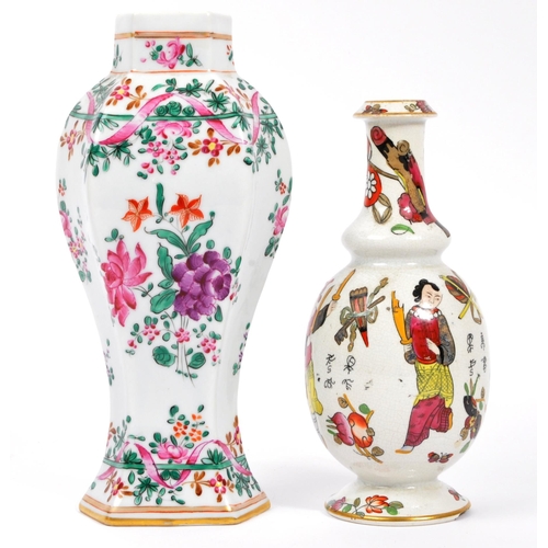 128 - A pair of 19th century Chinese / Oriental porcelain vases. Both vases being hand painted floral spra... 
