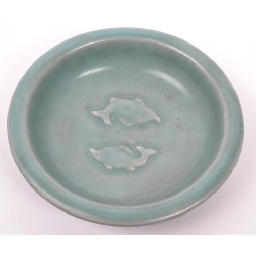 129 - An early 20th century Chinese / Oriental ceramic pottery artists brush bowl / dish in a green colour... 