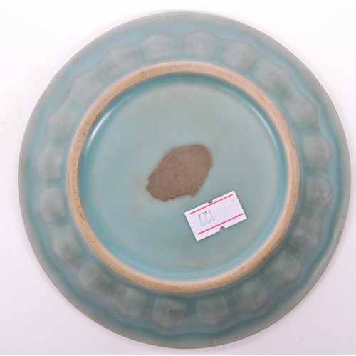 129 - An early 20th century Chinese / Oriental ceramic pottery artists brush bowl / dish in a green colour... 