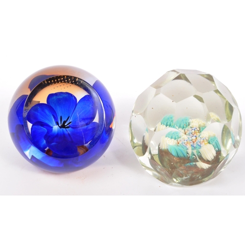 130 - A collection of five vintage mid 20th century paperweights by Caithness along with a Mdina bud vase.... 