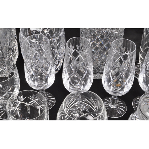 134 - A large collection of 19th Century cut glass. Including, various decanters some with stopper, drinki... 