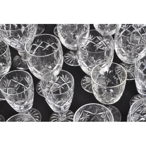 134 - A large collection of 19th Century cut glass. Including, various decanters some with stopper, drinki... 