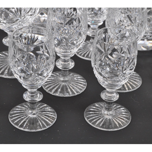 134 - A large collection of 19th Century cut glass. Including, various decanters some with stopper, drinki... 