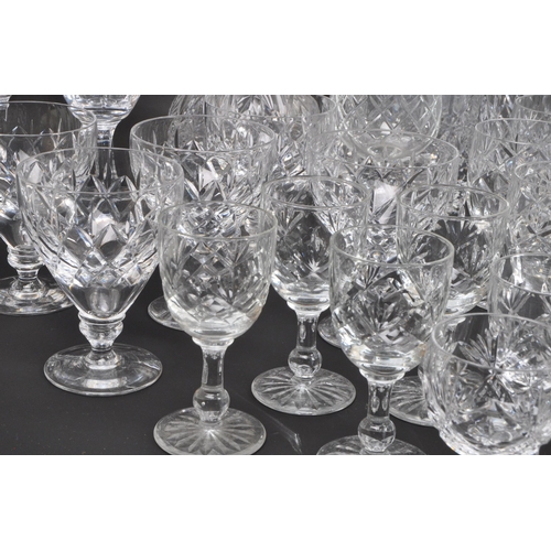 134 - A large collection of 19th Century cut glass. Including, various decanters some with stopper, drinki... 