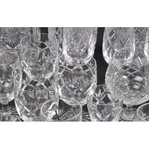 134 - A large collection of 19th Century cut glass. Including, various decanters some with stopper, drinki... 