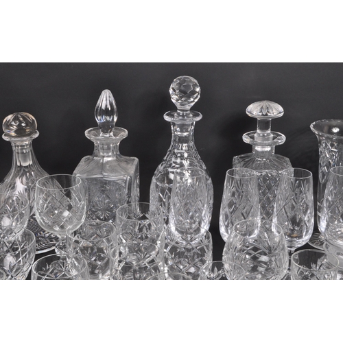 134 - A large collection of 19th Century cut glass. Including, various decanters some with stopper, drinki... 