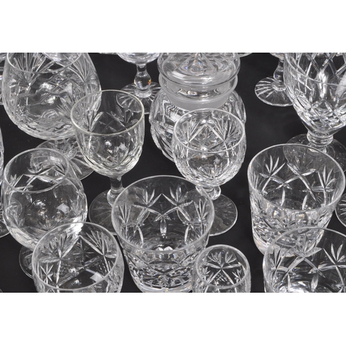 134 - A large collection of 19th Century cut glass. Including, various decanters some with stopper, drinki... 