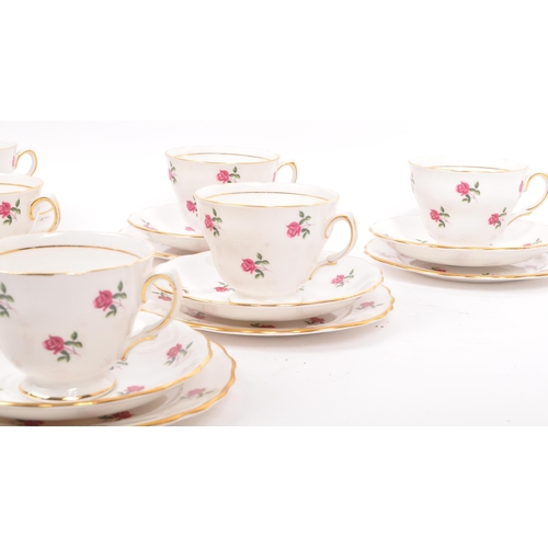 135 - A vintage 20th century bone china tea service to include a fine bone china service in the 'Colclough... 