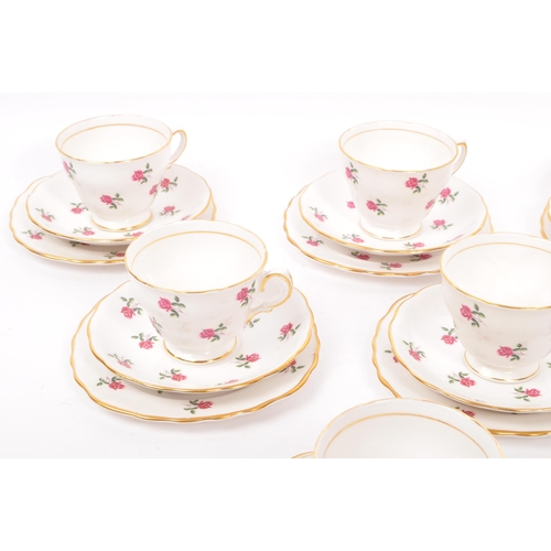 135 - A vintage 20th century bone china tea service to include a fine bone china service in the 'Colclough... 