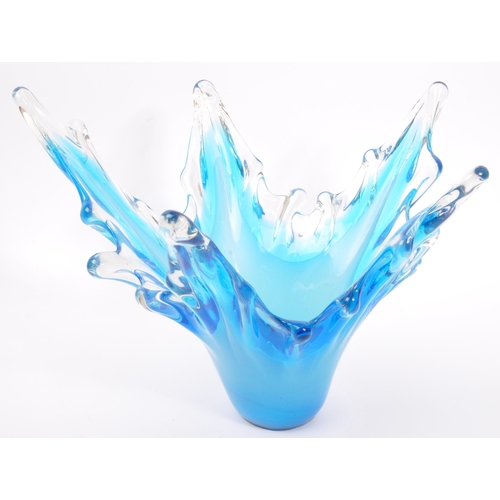 143 - A large 20th century studio glass centrepiece splash vase. The vase having varying tones of blue mod... 
