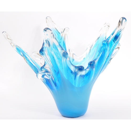 143 - A large 20th century studio glass centrepiece splash vase. The vase having varying tones of blue mod... 