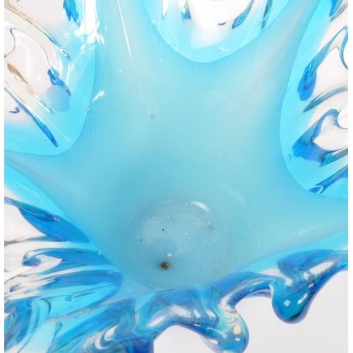 143 - A large 20th century studio glass centrepiece splash vase. The vase having varying tones of blue mod... 