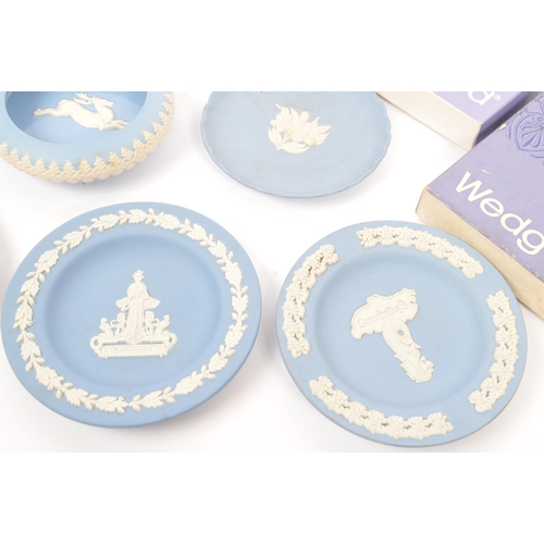 147 - Wedgwood - A collection of 20th century Wedgwood Jasperware. Each piece having jasperware blue groun... 