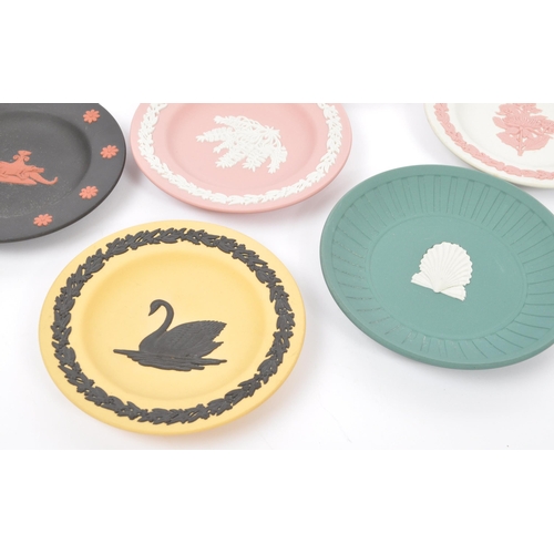 149 - Wedgwood - A series of 20th century Wedgwood jasperware dishes. Each piece having relief work upon v... 