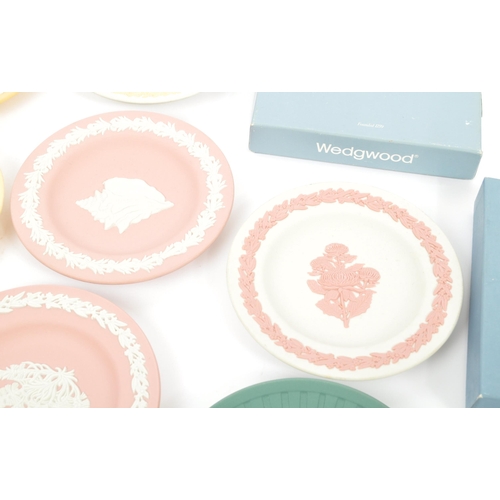149 - Wedgwood - A series of 20th century Wedgwood jasperware dishes. Each piece having relief work upon v... 