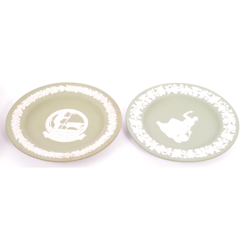 151 - Wedgwood - A collection of 20th century Wedgwood jasperware in sage green to include classical scene... 