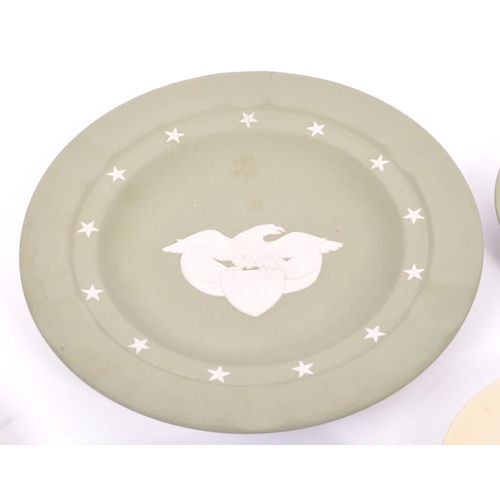 151 - Wedgwood - A collection of 20th century Wedgwood jasperware in sage green to include classical scene... 