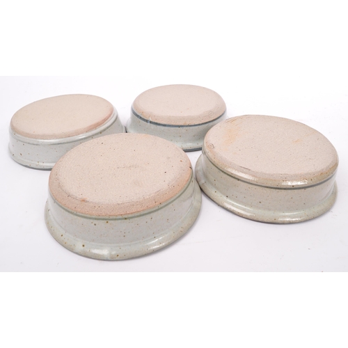 157 - Colin Kellam (b. 1942) A collection of four 20th century studio pottery stoneware tapas dishes / ser... 