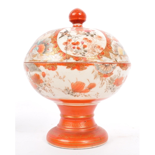 159 - A 19th Century Japanese Kutani lidded dish atop a plinth stand with red ochre grounds and gilded dec... 