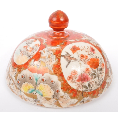159 - A 19th Century Japanese Kutani lidded dish atop a plinth stand with red ochre grounds and gilded dec... 