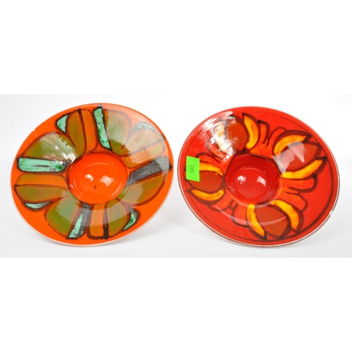 163 - A collection of 4 x retro vintage hand painted plates and bowls in the 'Delphis' design by Poole Pot... 