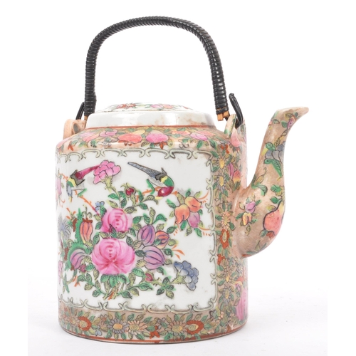 164 - A 19th century Chinese famille rose large teapot. Decorated with scenes of people - geisha to one ca... 