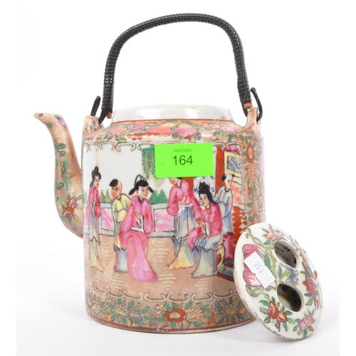 164 - A 19th century Chinese famille rose large teapot. Decorated with scenes of people - geisha to one ca... 