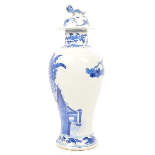 168 - A 19th Century Chinese oriental porcelain blue and white baluster shaped lidded vase. The vase decor... 