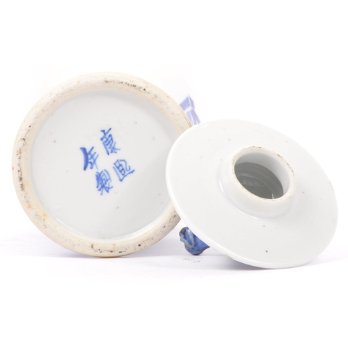 168 - A 19th Century Chinese oriental porcelain blue and white baluster shaped lidded vase. The vase decor... 