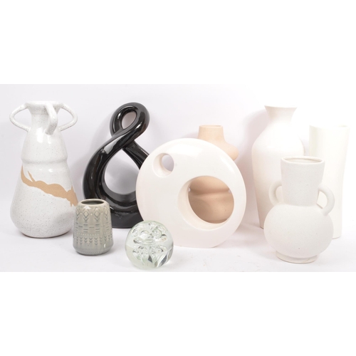 169 - A large collection of vintage 20th century and contemporary studio pottery to include a circular orn... 