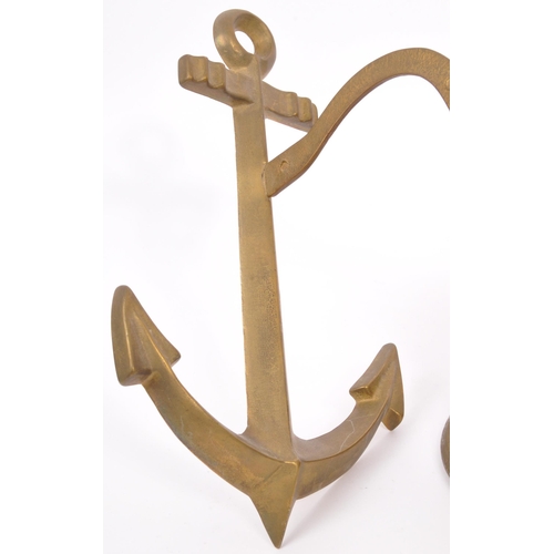 349 - A 20th Century vintage brass ship bell marked 'MS Bremen 1911' with anchor attachment. Measuring app... 