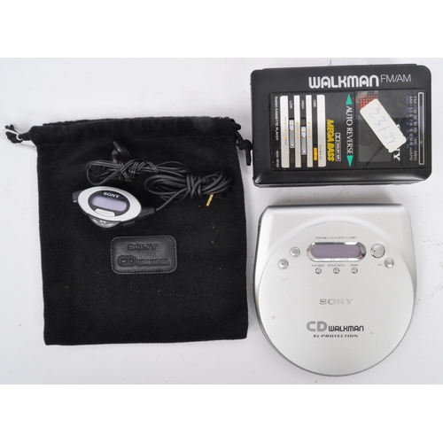 401 - A vintage retro 20th century Sony Walkman Mega Bass portable audio player together with a Walkman CD... 