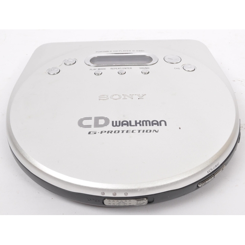 401 - A vintage retro 20th century Sony Walkman Mega Bass portable audio player together with a Walkman CD... 