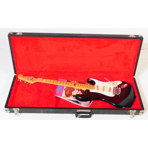 415 - Marlin sidewinder electric guitar. Having an ebonised shaped body with white fret board and beech ne... 