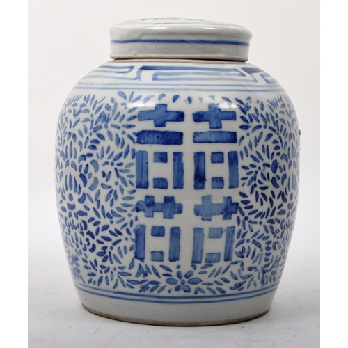 140 - A late 19th century Chinese Qing Dynasty blue and white lidded ginger jar having with scrolling leaf... 