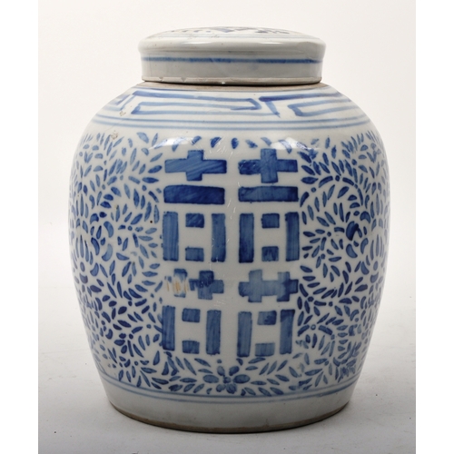 140 - A late 19th century Chinese Qing Dynasty blue and white lidded ginger jar having with scrolling leaf... 