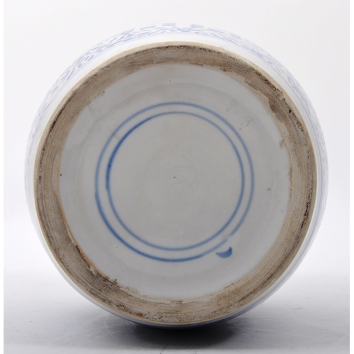 140 - A late 19th century Chinese Qing Dynasty blue and white lidded ginger jar having with scrolling leaf... 