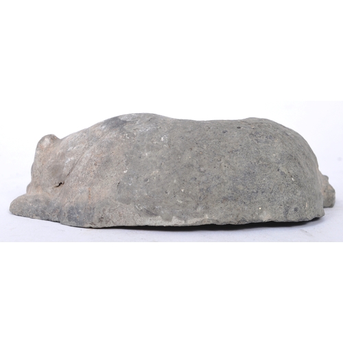 196 - A Tang Dynasty Chinese hand moulded clay earthenware burial funerary figure of a lying dog with pain... 