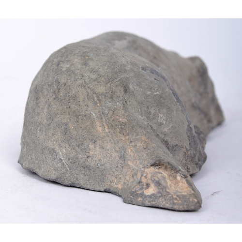 196 - A Tang Dynasty Chinese hand moulded clay earthenware burial funerary figure of a lying dog with pain... 