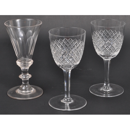 154 - A collection of 19th century and later glass decanters and drinking glasses to include signed Tudor ... 