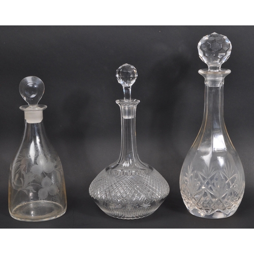 154 - A collection of 19th century and later glass decanters and drinking glasses to include signed Tudor ... 