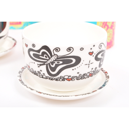 155 - A set of four boxed NOS New Old Stock Ritzenhoff My Lian china teacup and saucers having abstracted ... 