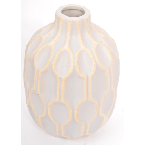 171 - A collection of contemporary studio art pottery. Comprising of a tapering twin handled vase, a textu... 