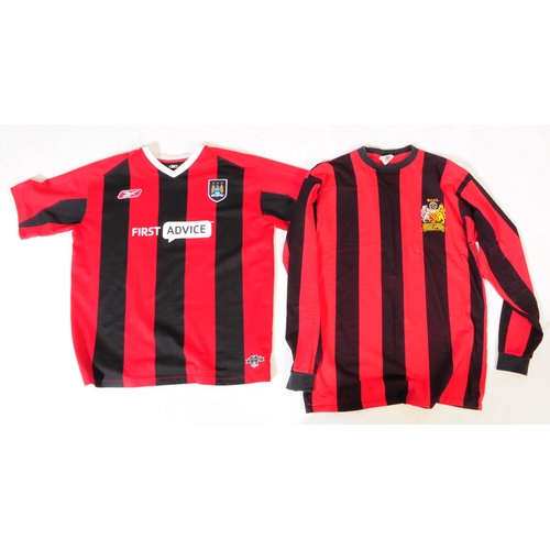 399 - A large collection of vintage 20th century and later Manchester City Football club shirts, T shirts ... 