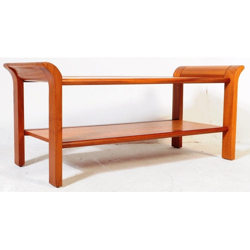 798 - British Modern Design -  A 1970's retro vintage sleigh teak wood coffee table in the manner of  - G ... 