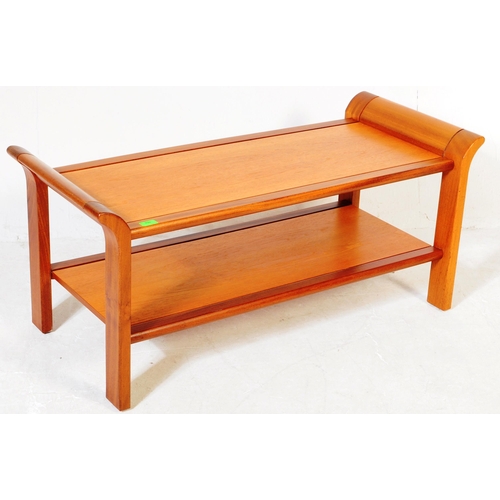 798 - British Modern Design -  A 1970's retro vintage sleigh teak wood coffee table in the manner of  - G ... 