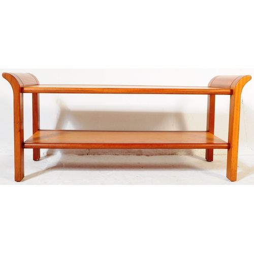 798 - British Modern Design -  A 1970's retro vintage sleigh teak wood coffee table in the manner of  - G ... 