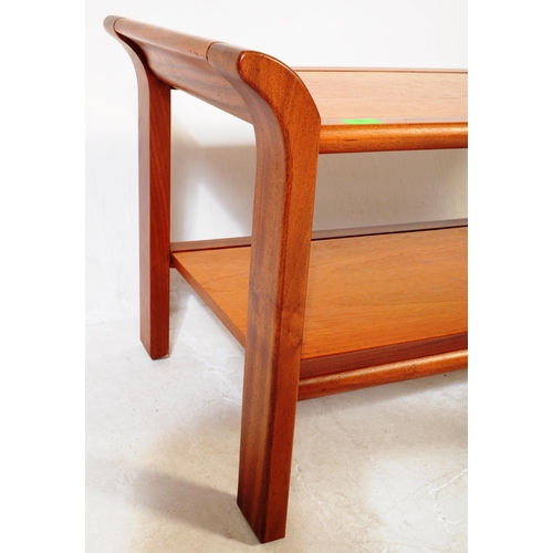 798 - British Modern Design -  A 1970's retro vintage sleigh teak wood coffee table in the manner of  - G ... 